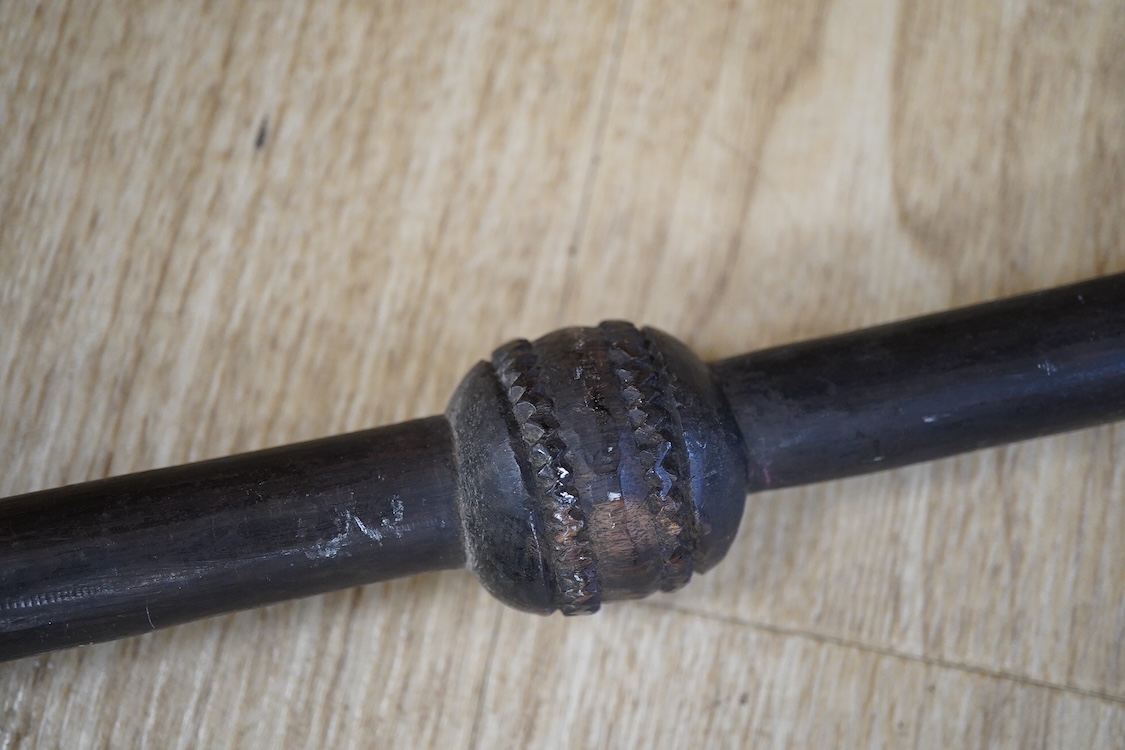 A Nigerian tribal ebony staff, 169cm long